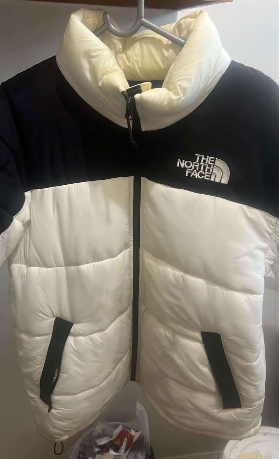 The North Face white and black puffer jacket