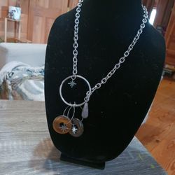 Two very unique necklace one has a Matching earrings