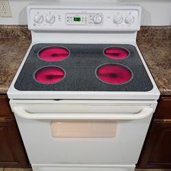 GE, WHITE  ELECTRIC  STOVE.