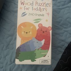 Toddler 4 Puzzle Set featuring Zoo Animals with numbered pieces