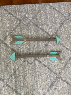 2 wooden arrows
