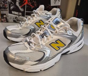 New Balance 530
Silver Yellow Metalic Men's Size 8.5