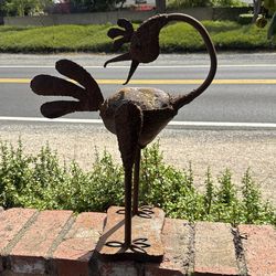 Handcrafted, roadrunner, metal and rock sculpture