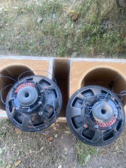 Dual Kicker Subwoofers in Ported Wooden Box