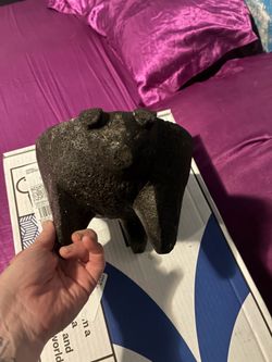 Primitive figural pumice molcajete