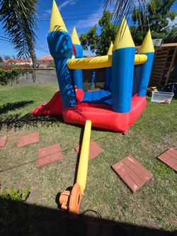 Happy hop inflatable bouncer with air blower and 3 ground stakes