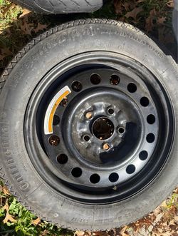 Used Spare Tire with Black Steel Wheel ( Spare only )