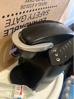 Coffee machine with reusable filter
