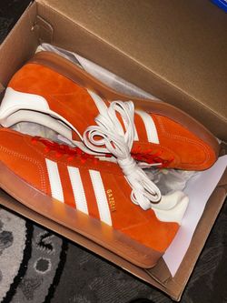 Orange Adidas Gazelle sneakers