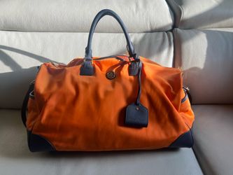 Orange TORY BURCH weekender bag