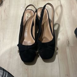 These Are Cute Black Heels With A Strap Back 