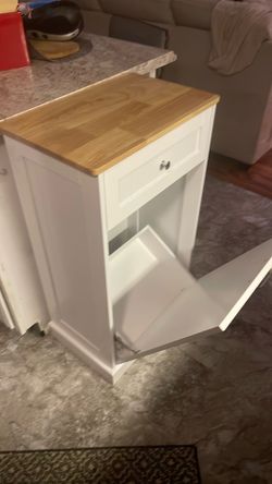 New never used enclosed trash cabinet