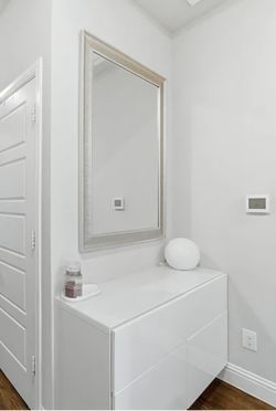 Mirror with glass top drawer