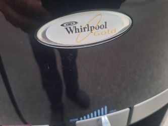 STAINLESS STEEL WHIRLPOOL GOLD TOP- LOAD WATER DISPENSER. 