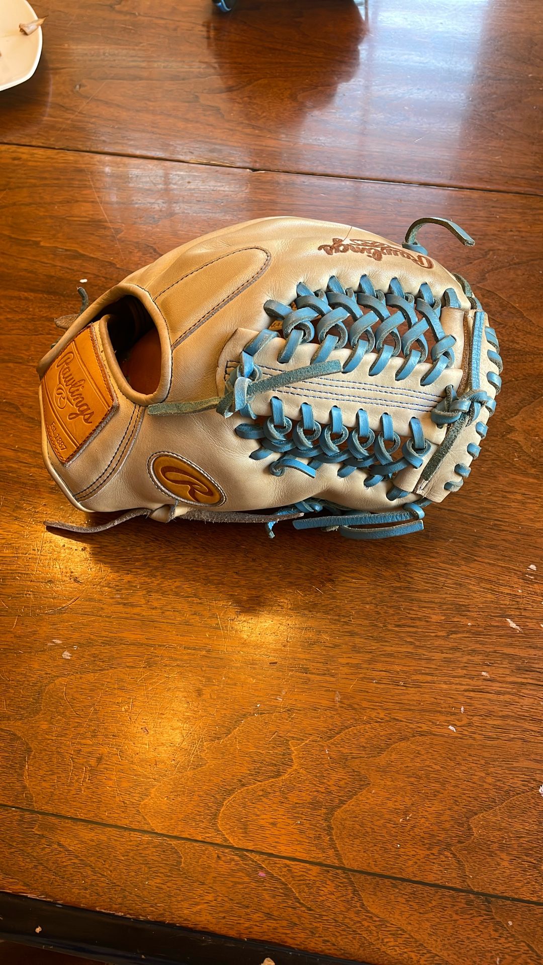 Used in great condition Rawlings heart of the hide R2G limited edition #22- 200 pattern PROR205-4TC size 11 3/4 infield glove tan with light blue lace