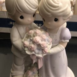 Precious moments “love vows to always bloom”