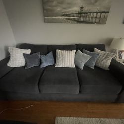 dark grey couch: living spaces