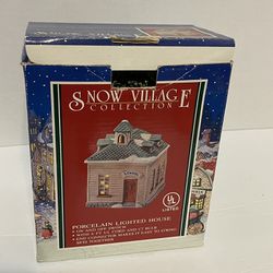 Snow Village Collection porcelain lighted schoolhouse with trees in original box. 