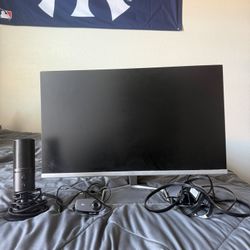HP desktop monitor (24-inch class) with Razer Microphone and Logi Webcam