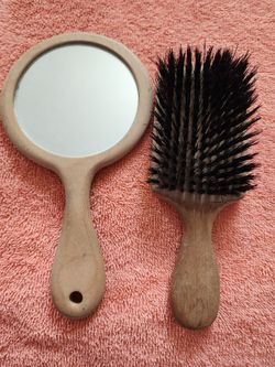 Antique mirror and brush