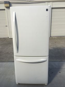 Kenmore beige refrigerator