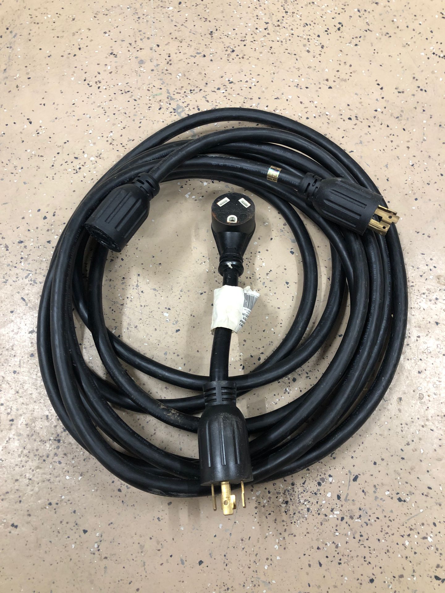 24’ generator cable plus an RV adapter