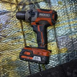 RIDGID 18V Brushless 1/2 in. Hammer Drill with an 18V 2.0 Ah battery attached