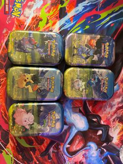 Ascended heroes tins