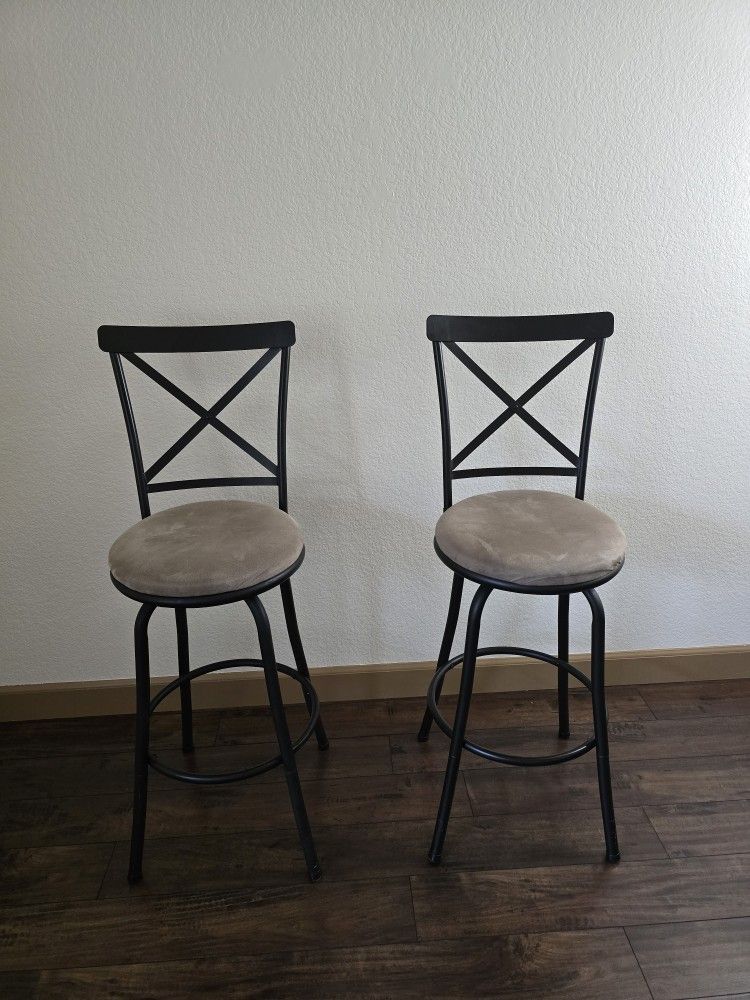 2 swivel chairs