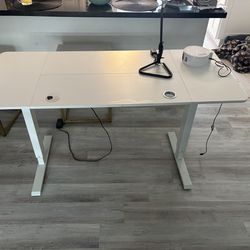 Adjustable desk.