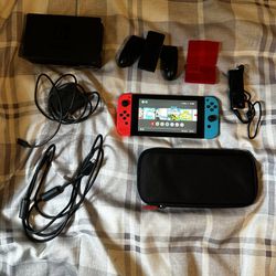 Nintendo Switch + Carrying Case
