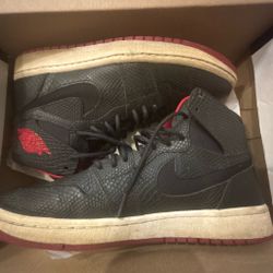 Black and red, Nike snake skin shoes, size 8.5