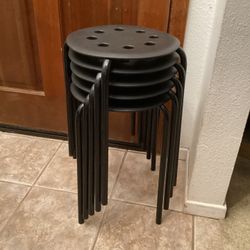Five Black Plastic Bar Stools with Legs
