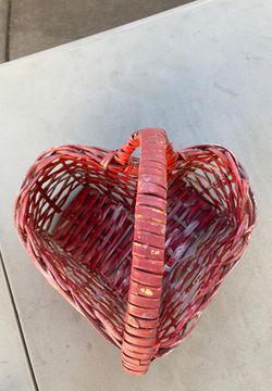 Red heart shaped wicker basket