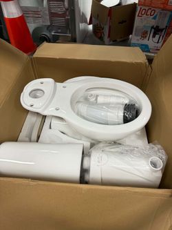 New upflush toilet for basement with pump