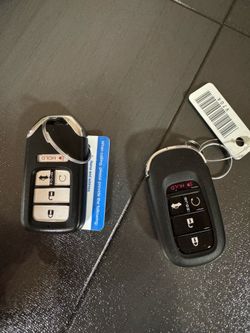 Two keys for Honda one of them Honda Civic 2018 and another one Honda Accord 2023