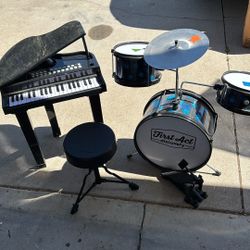 Kids drum sets and piano