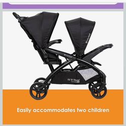 NEW BABY TREND DOUBLE SIT N STAND STROLLER