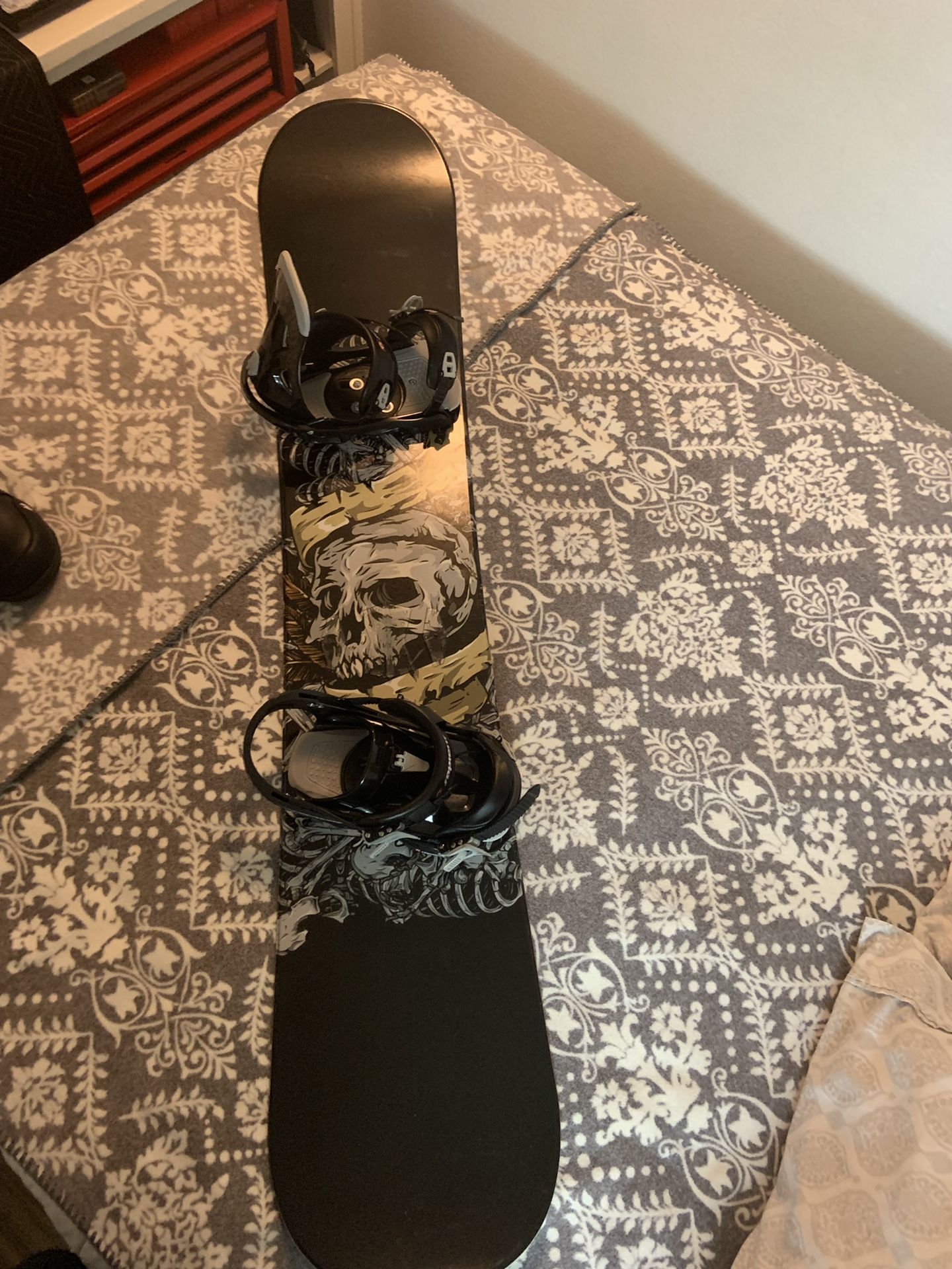 Complete snowboarding package snowboard, bindings, stomp pad, boots