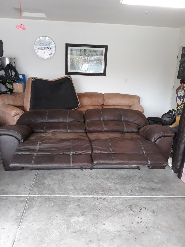 Brown couch with two Brown Electric reclining chairs