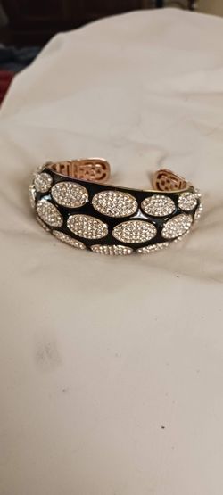 Ryan Stone hinged cuff.