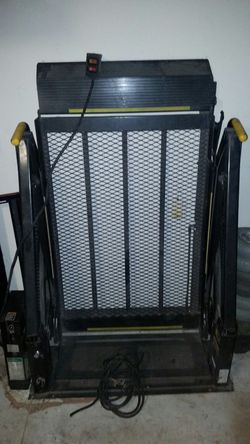 Conversion van lift for wheelchair or powerchair