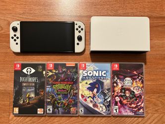 Nintendo Switch Oled with 4 games