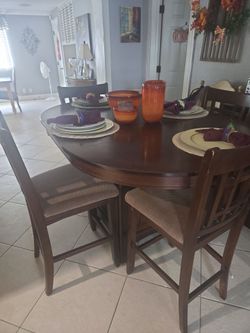 Dining table and 4 chairs