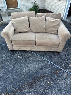 Tan loveseat