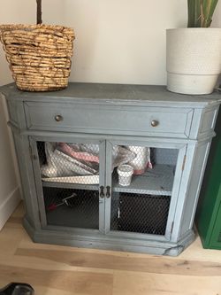 Distressed Gray Wood Cabinet with Wire Doors