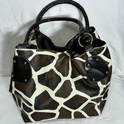 Super nice giraffe print handbag with red lining, very spacious.  