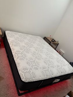 Queen sized mattress and LED light floating bed frame