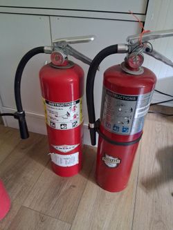 2 unused fire extinguisher big ones like new