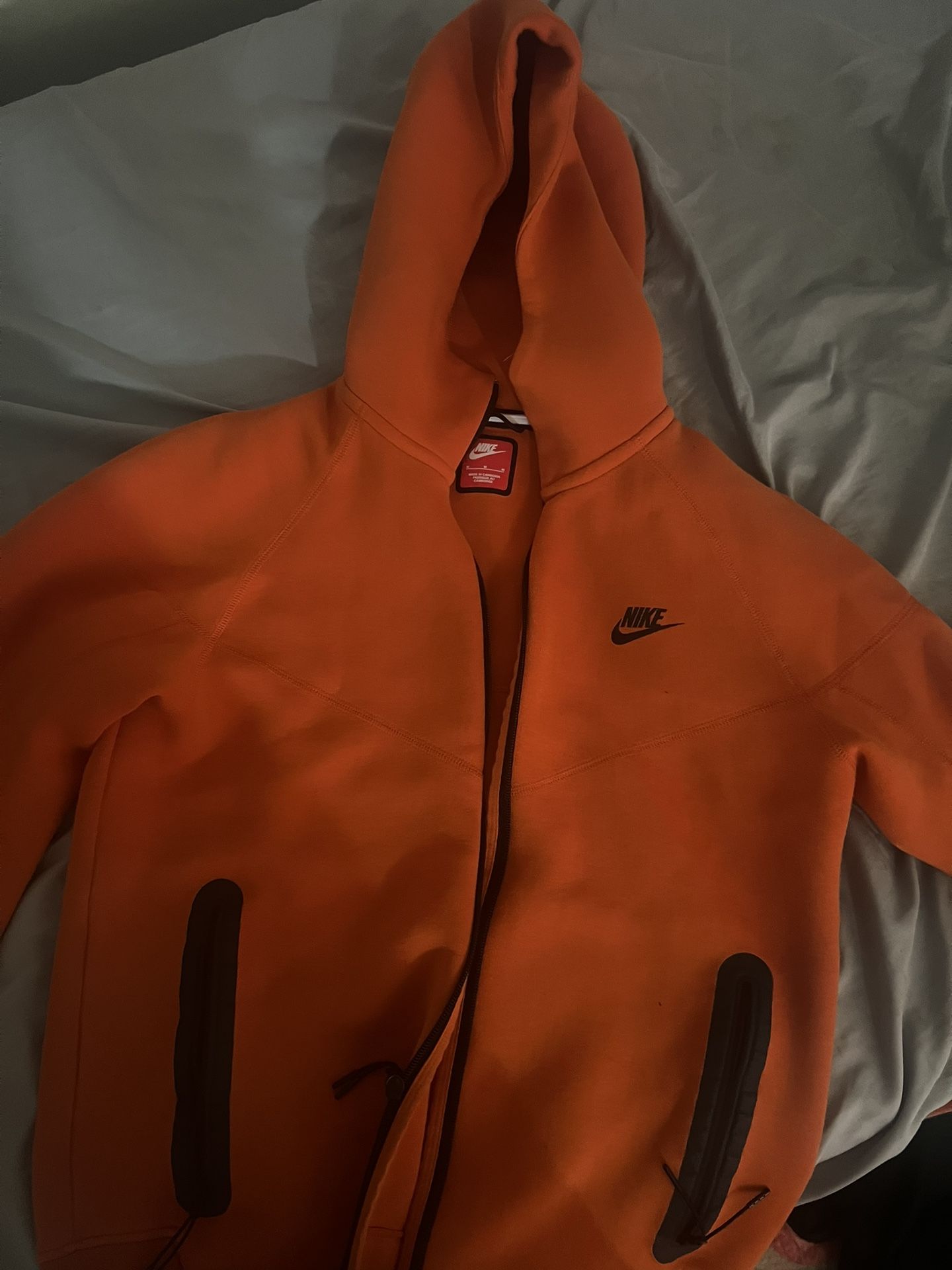 Orange Nike Tech